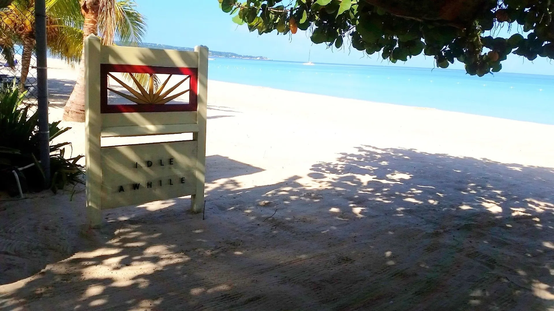 Idle Awhile Resort Негрил Отель